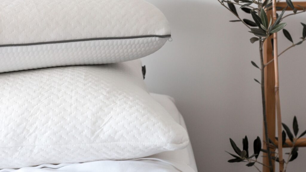 Pillows on white sheets